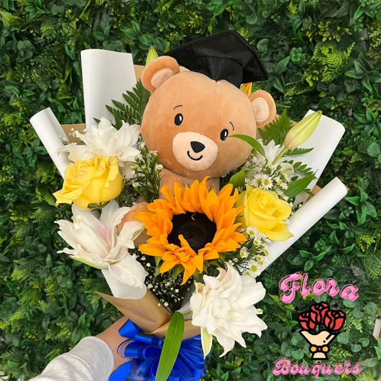 Custom yellow flower graduation bouquet with teddy bear by Flora Bouquet in Green Bay
